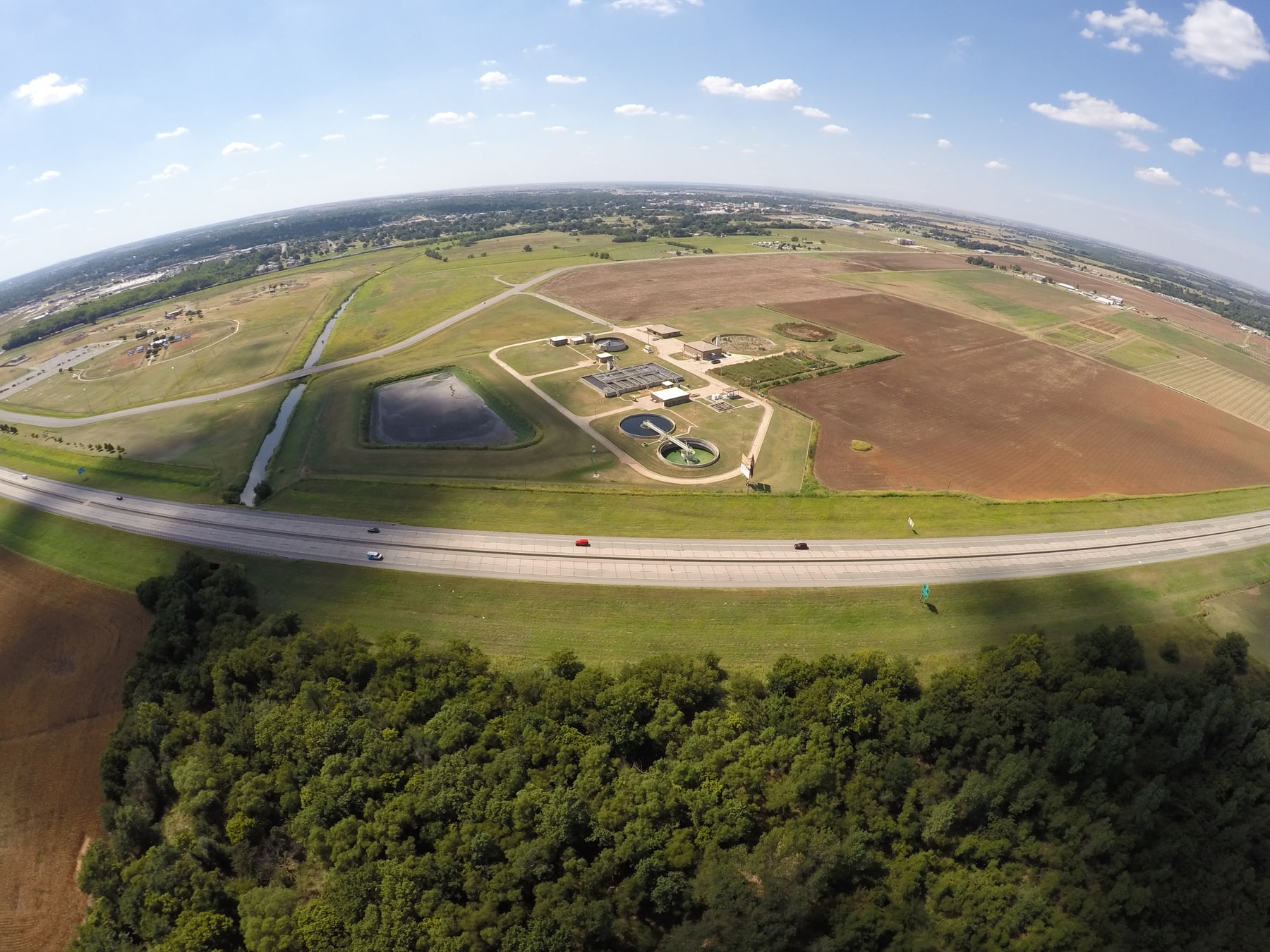 An aerial view shows a wastewater-treatment plant among fields near Chickasha, Oklahoma.